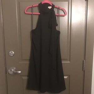 Black halter shift dress with self tie bow
